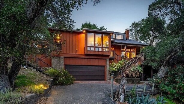 A modern house with a garage, a staircase, and a well-maintained garden. - 14-Acre Estate with Private Pool near Pismo Beach (San Luis Obispo)