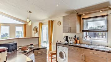 Oven, dishwasher, highchair, cookware/dishes/utensils