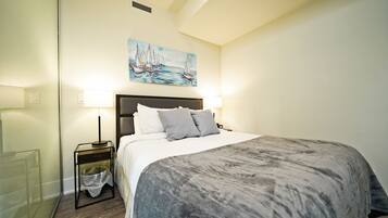 Departamento Deluxe, varias camas | Tabla de planchar con plancha, wifi gratis y ropa de cama