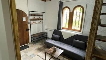 Comfort Room, Garden View | Living area | 80-inch flat-screen TV with digital channels