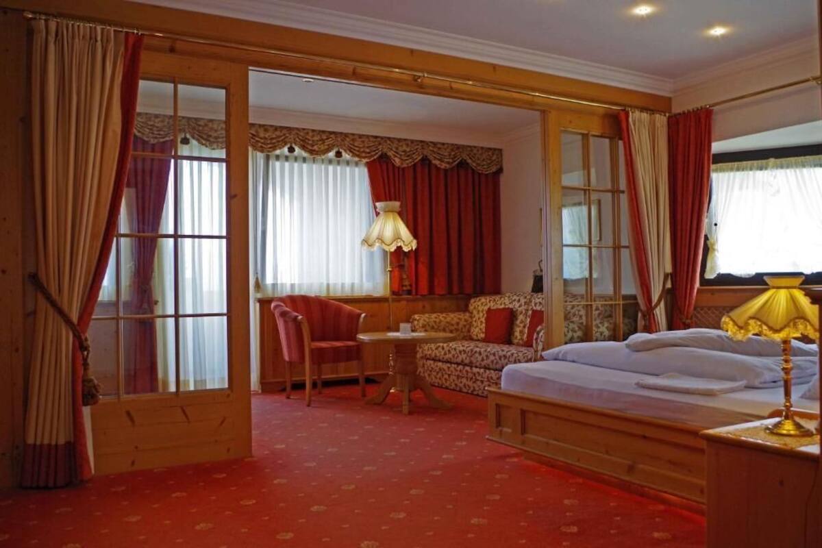 Junior Suite, Balcony, Garden View | Premium bedding, minibar, in-room safe, blackout drapes