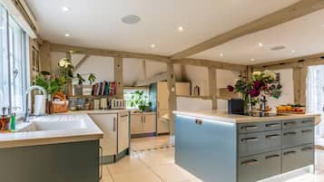 Oven, dishwasher, high chair, cookware/dishes/utensils