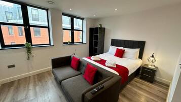 Junior Apartment, City View | Blackout drapes, iron/ironing board, free WiFi, bed sheets