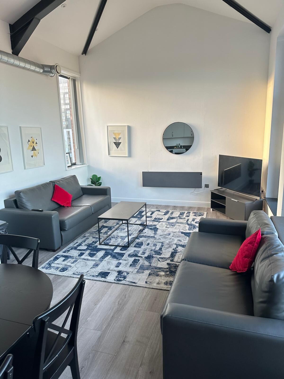 Grand Penthouse, 2 Bedrooms, Non Smoking, City View | Living area | 45-inch Smart TV with digital channels