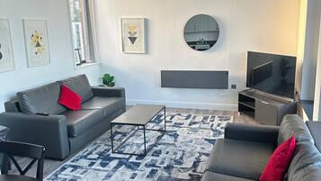 Grand Penthouse, 2 Bedrooms, Non Smoking, City View | Living area | 45-inch Smart TV with digital channels