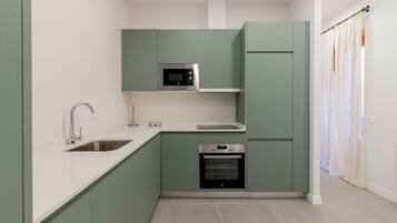 Deluxe Apartment, 2 Bedrooms | Private kitchen | Full-size fridge, microwave, oven, stovetop