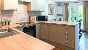 Microwave, oven, high chair, cookware/dishes/utensils