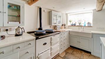 Oven, dishwasher, high chair, cookware/dishes/utensils