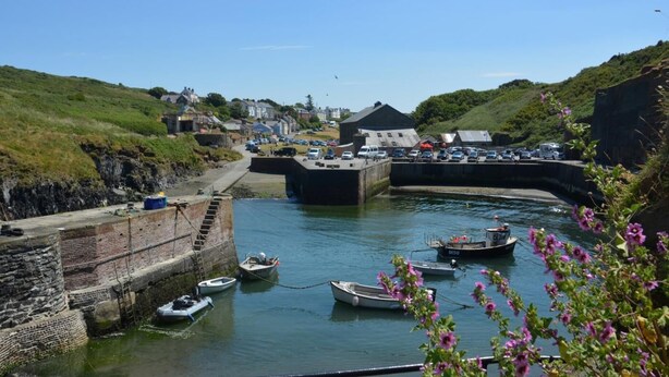 A coastal town with a harbor, boats, and a bridge. - 1 Bed in Haverfordwest (oc-61170) (Porthgain)