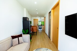 Family Apartment, 2 Bedrooms, Balcony, City View | Living area - The BHA Riverside (Ngu Hanh Son)