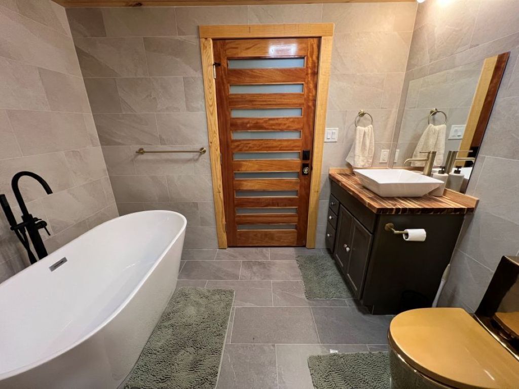 Shower, towels, soap, toilet paper
