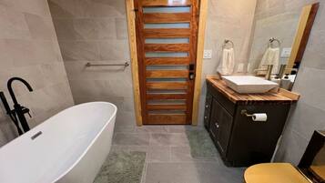 Shower, towels, soap, toilet paper