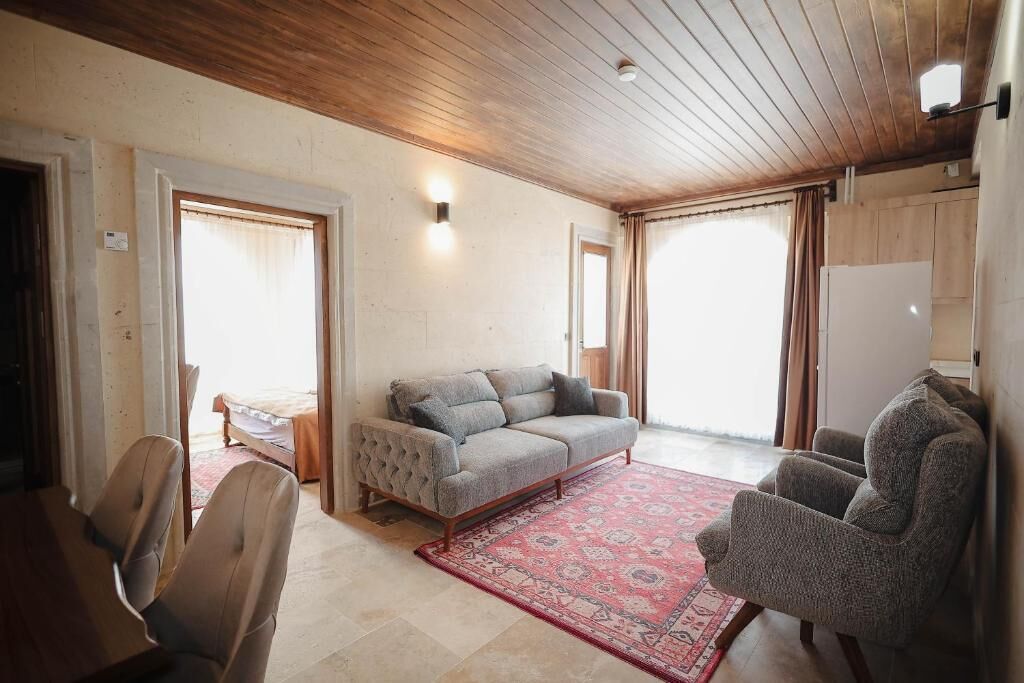 Comfort-Apartment, Balkon, Stadtblick | Wohnbereich