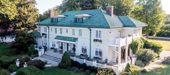Charming second-floor room with queen bed, private bath with shower, and garden views within the Belvedere Estate in Saugatuck