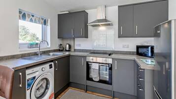 Oven, high chair, cookware/dishes/utensils