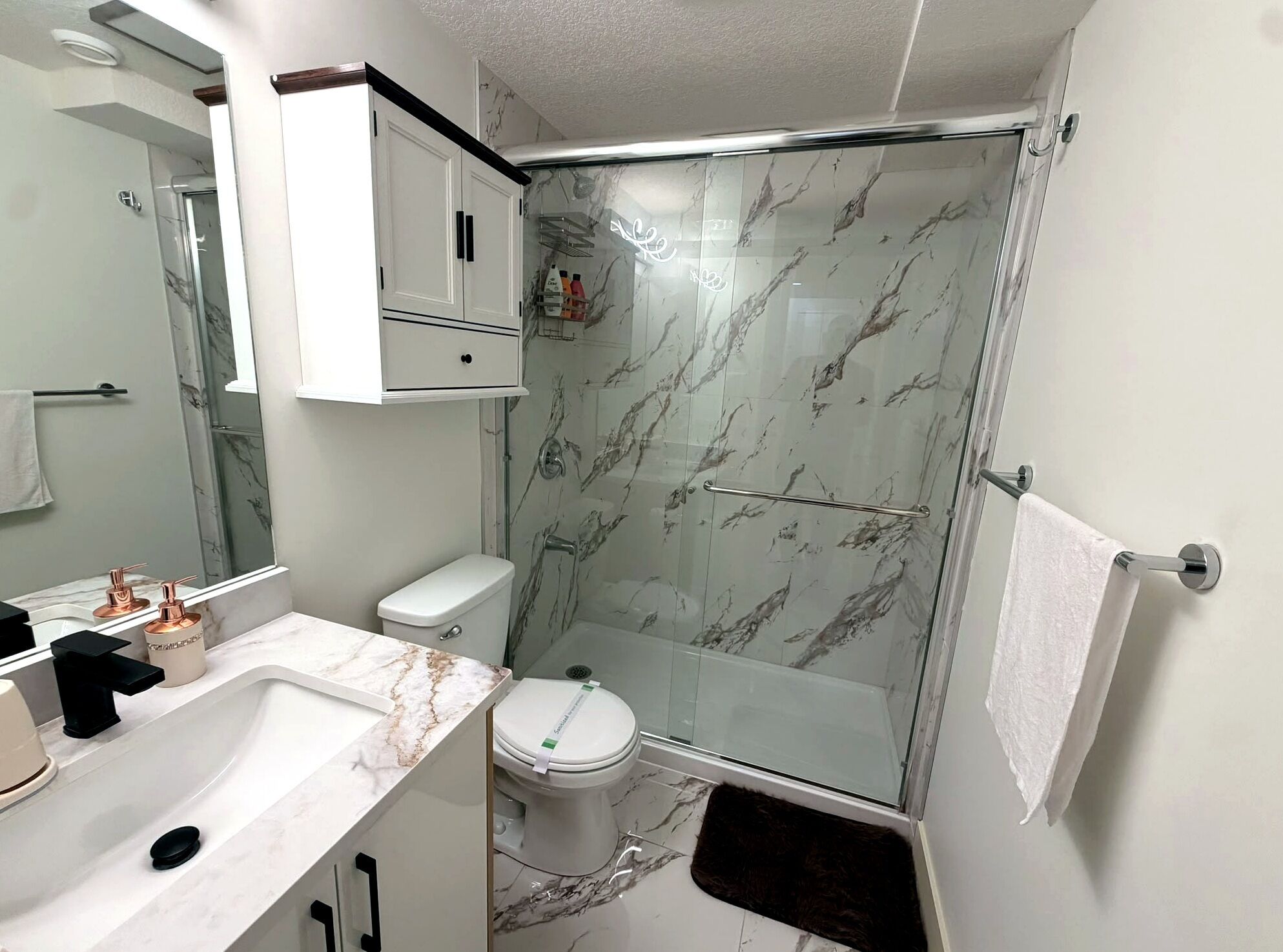 Hair dryer, towels, soap, toilet paper