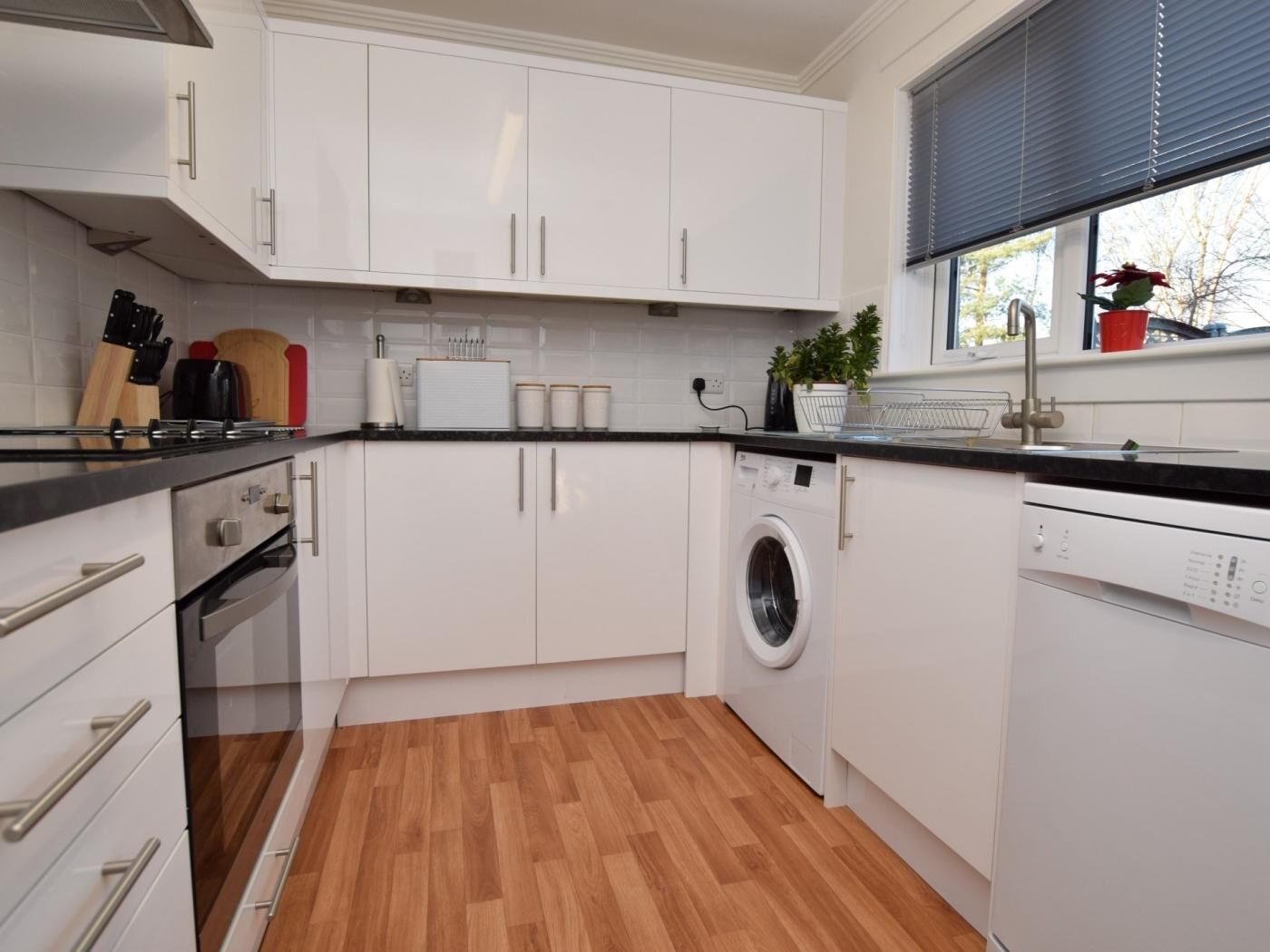 Oven, dishwasher, high chair, cookware/dishes/utensils