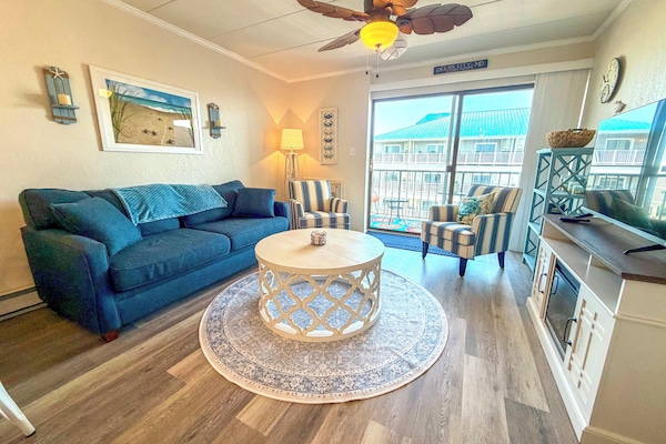 Coastal-inspired decor, abundant natural light, and comfortable seating!