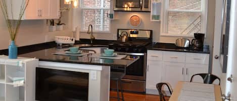 Coffee/tea maker, fridge, microwave, stovetop
