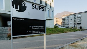 A sign for 'SUPSI Campus Est' with a modern building in the background. - {Suite 410} Gym, Business Room, Modern, Relax (Lugano)