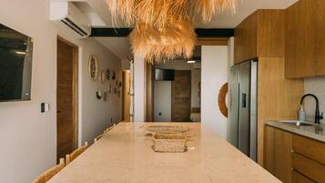 Deluxe appartement, privézwembad | Interieur