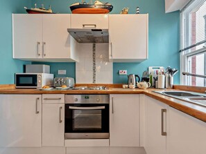 Oven, high chair, cookware/dishes/utensils - 2 Bed in Tenby (oc-fb122) (Tenby)
