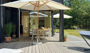 Outdoor dining - New-build timber house with private garden (Hals)