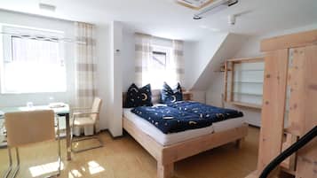 Apartamento familiar, no fumadores, Aire acondicionado | Caja fuerte, wifi gratis, mobiliario individual y ropa de cama