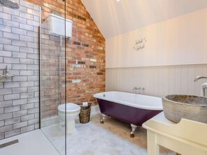 A bathroom with a glass shower enclosure, a freestanding bathtub, a toilet, and a sink with a stone basin. - 3 Bed in Belper (oc-83037) (Blackbrook)