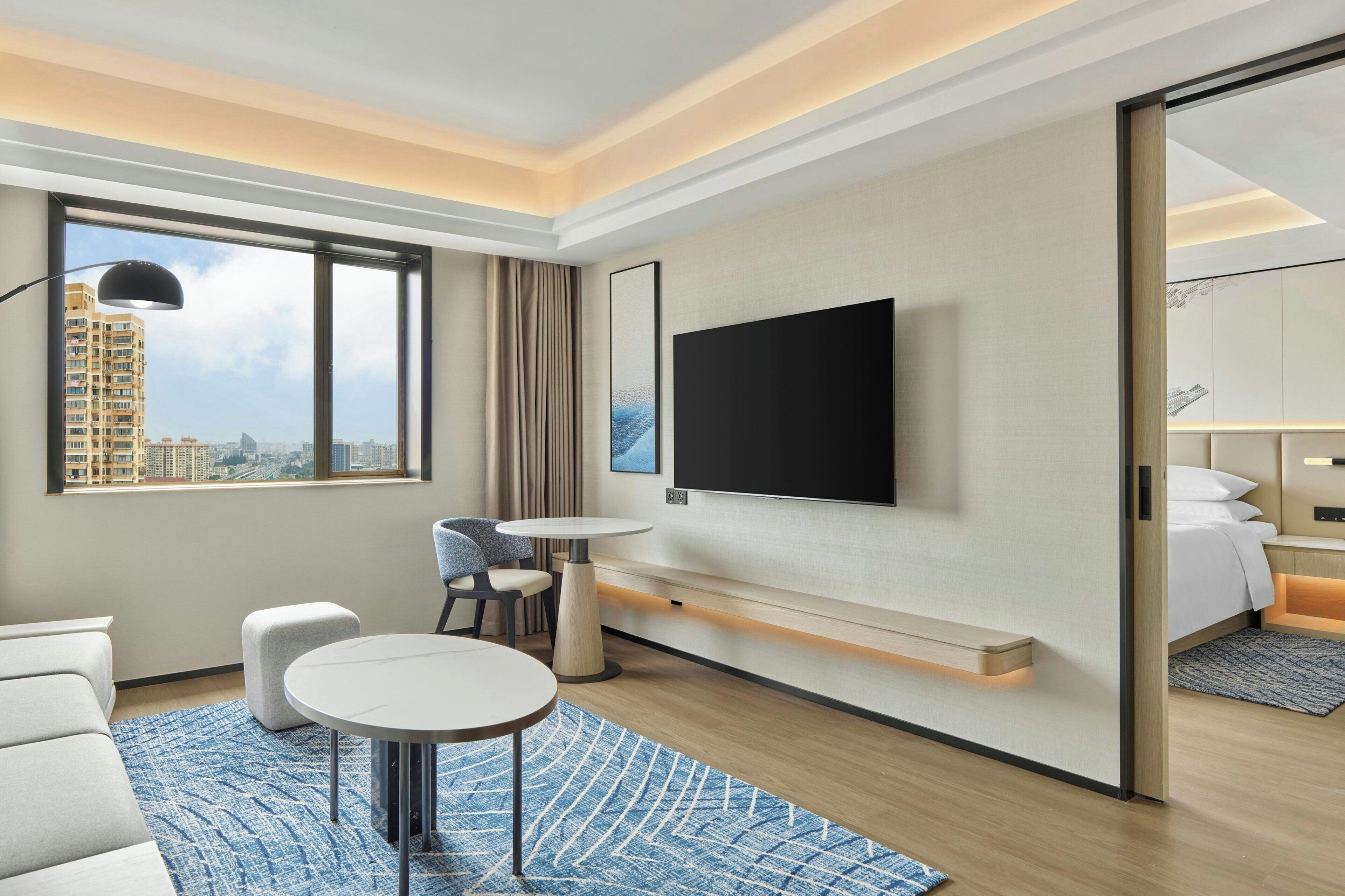 Comfort suite, 1 kingsize bed, uitzicht op stad | Woonkamer