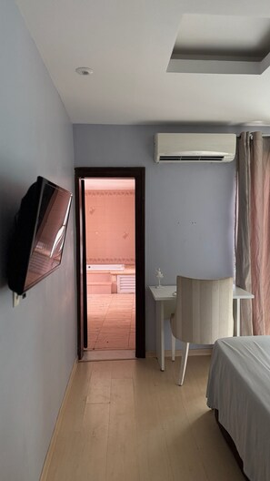 Comfort Room, Balcony, Pool View | Iron/ironing board (on request), WiFi (free)