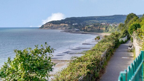 A coastal road with a view of cliffs and the sea. - 1 Bed in Sandown (oc-85248) (Sandown)