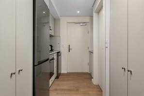 Fridge, microwave, oven, stovetop - Elegant Studio | Dolce Vita | Sea Point (Cape Town)