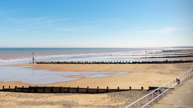 A beach with a wooden walkway and a rocky foreground. - 1 Bed in Hornsea (oc-85722) (Hornsea)