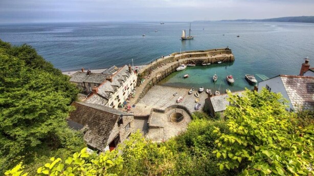 A coastal town with a historic stone pier, boats, and lush greenery. - 1 Bed in Bideford (oc-86571) (Hartland)