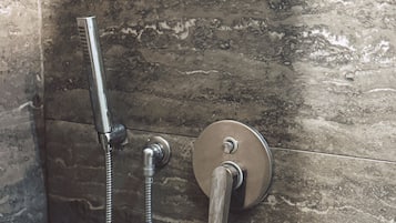 Deluxe Apartment, City View | Bathroom | Shower, hair dryer, towels, soap