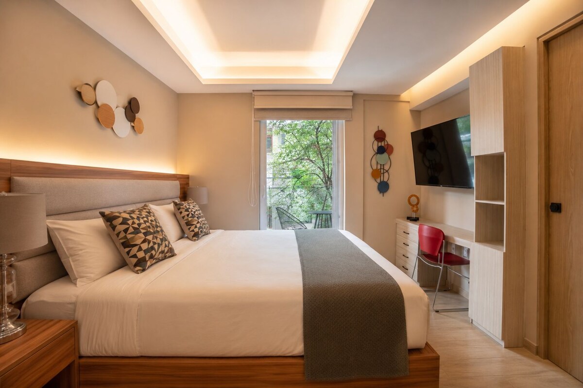 Suite estudio superior, vista a la ciudad | Ropa de cama de alta calidad y camas con pillow-top