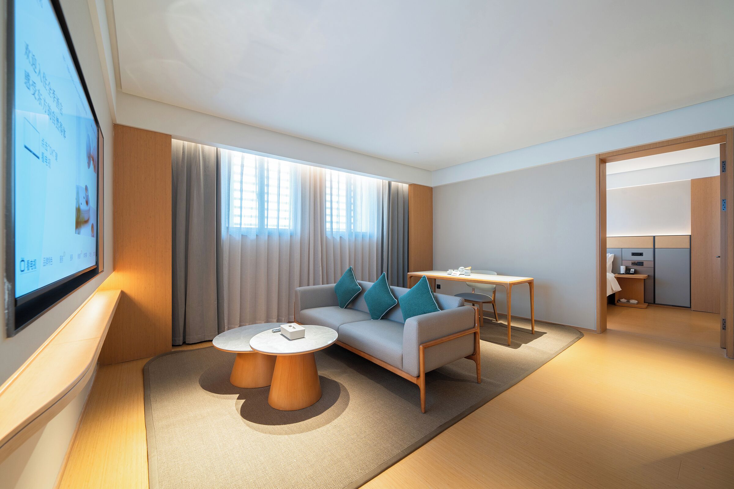 Suite Luxe, vue ville | Coin séjour