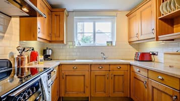 Microwave, dishwasher, high chair, cookware/dishes/utensils
