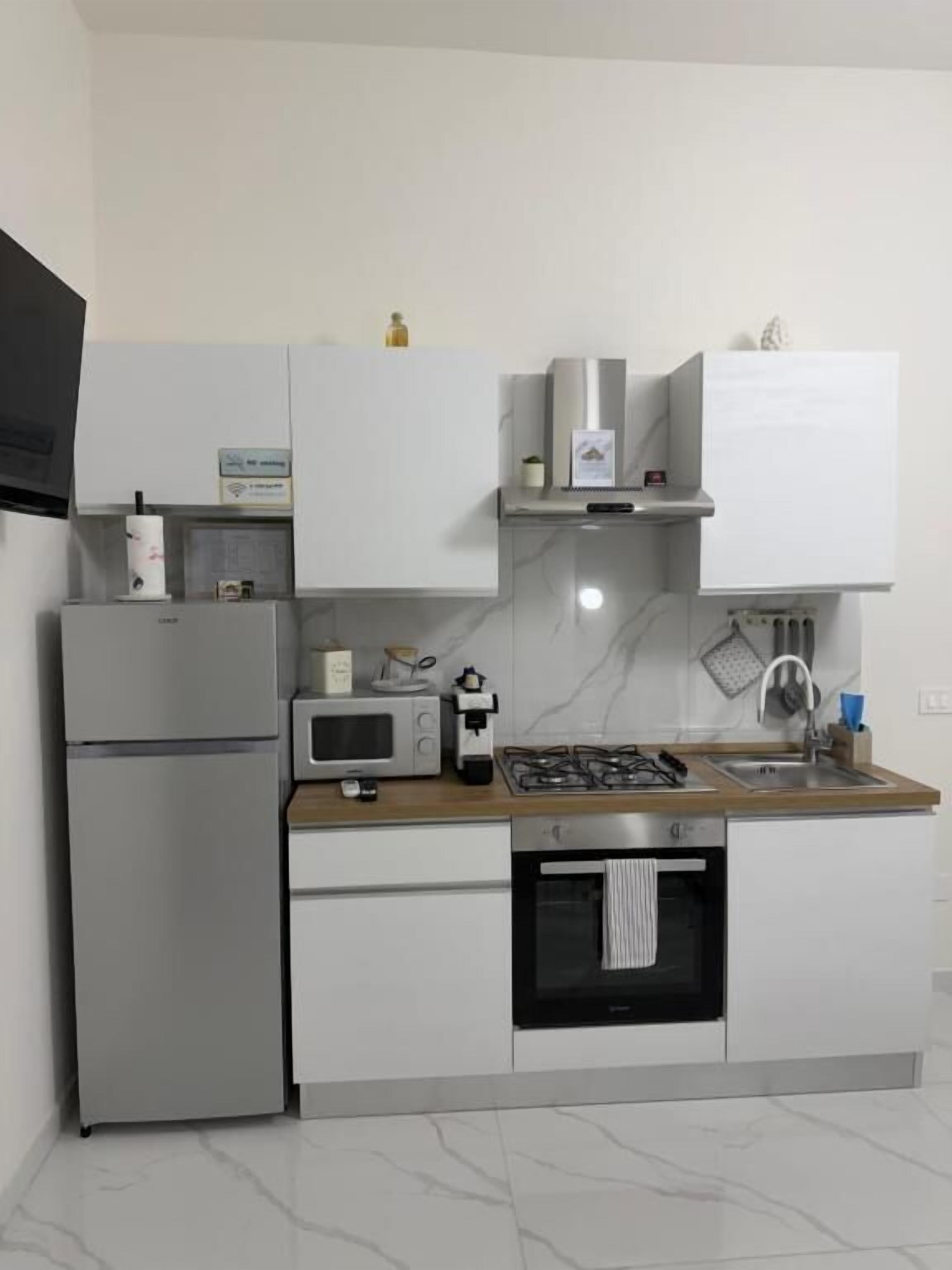 Doppia Junior | Cucina privata | Microonde, forno, piano cottura, pentole/stoviglie/utensili