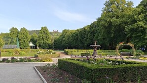 A park with a fountain, neatly trimmed hedges, and a gazebo. - 4 Bed in Matlock (oc-88011) (Matlock)