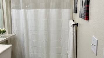Hair dryer, towels, soap, toilet paper