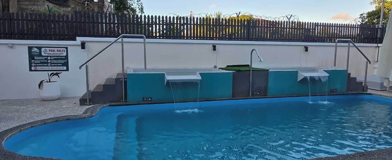 Outdoor pool, open 6:00 AM to 7:00 PM, pool loungers