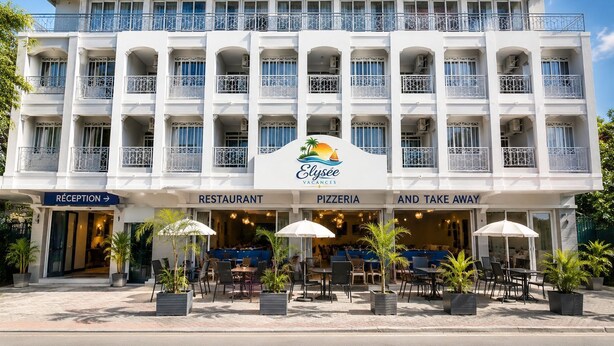 A hotel with a reception, restaurant, pizzeria, and take-away area.