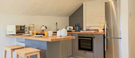 Oven, dishwasher, highchair, cookware/dishes/utensils