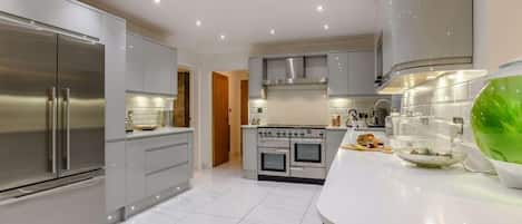 Oven, dishwasher, high chair, cookware/dishes/utensils
