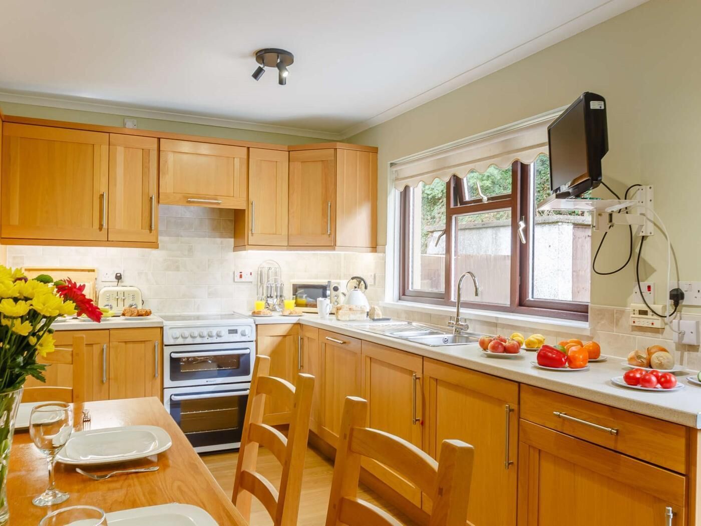 Oven, dishwasher, high chair, cookware/dishes/utensils
