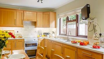 Oven, dishwasher, high chair, cookware/dishes/utensils