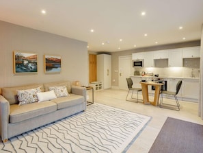 A modern apartment with a living room, dining area, and kitchen. - 1 Bed in Ambleside (oc-90636) (Ambleside)