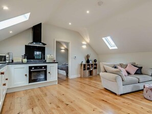 A loft-style apartment with a kitchen, living area, and a skylight. - 1 Bed in Bakewell (oc-91367) (Youlgreave)
